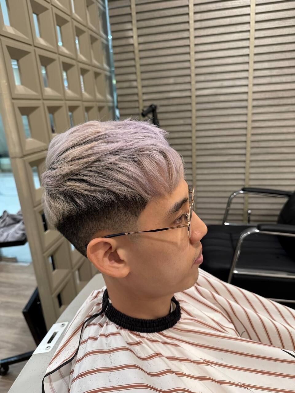 Silver-ash men's colour with a fade